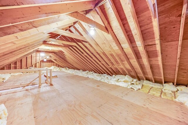 24 Emerald Ln, Falmouth, MA 02536 - unfinished attic with an upstairs landing