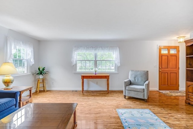 24 Emerald Ln, Falmouth, MA 02536 - living area with light wood-type flooring