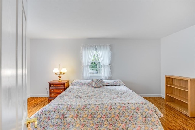 24 Emerald Ln, Falmouth, MA 02536 - bedroom with wood finished floors and baseboards