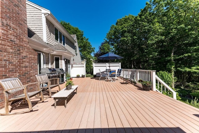 11 Polaris Dr, Mashpee, MA 02649 - wooden deck featuring area for grilling and outdoor dining space