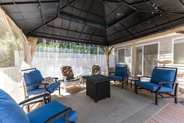 11 Polaris Dr, Mashpee, MA 02649 - view of patio with an outdoor living space, fence, and a gazebo