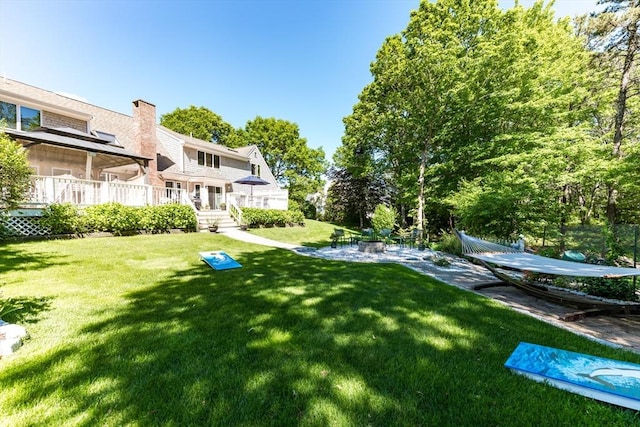 11 Polaris Dr, Mashpee, MA 02649 - view of yard featuring a patio