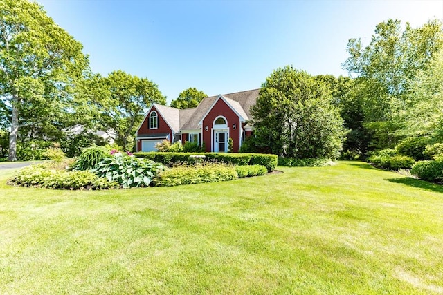 11 Polaris Dr, Mashpee, MA 02649 - view of front of property featuring a front lawn and an attached garage
