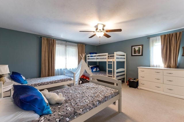 11 Polaris Dr, Mashpee, MA 02649 - bedroom with light colored carpet, ceiling fan, and multiple windows