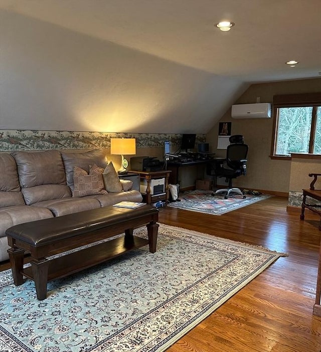 11 Polaris Dr, Mashpee, MA 02649 - living room with recessed lighting, a wall unit AC, wood finished floors, baseboards, and lofted ceiling