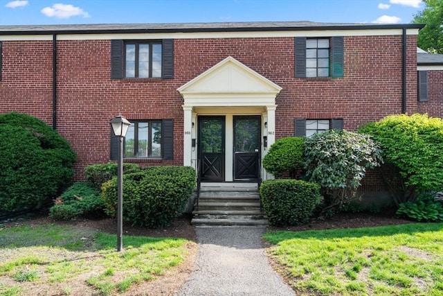 view of front of property with brick siding