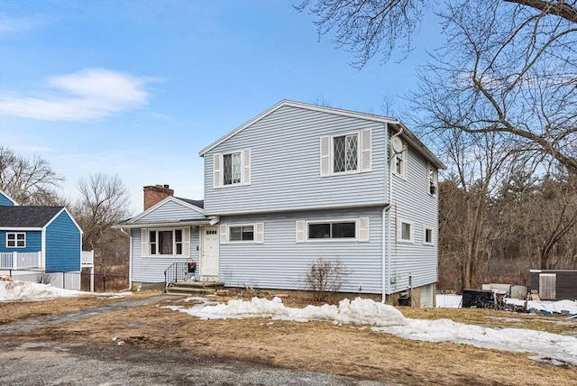 colonial home with a chimney