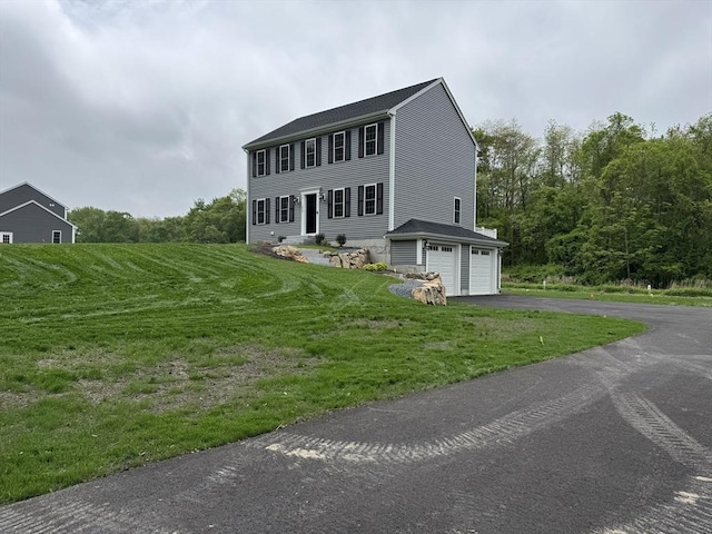 200 Pine St, Rehoboth, MA 02769 - colonial home featuring driveway, a front yard, and a garage