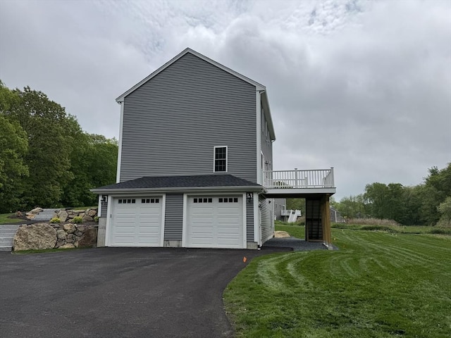 200 Pine St, Rehoboth, MA 02769 - view of property exterior with a wooden deck, driveway, a lawn, a garage, and stairway