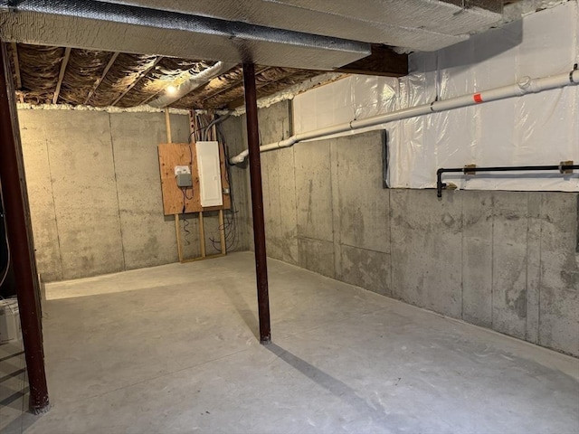 unfinished basement with electric panel