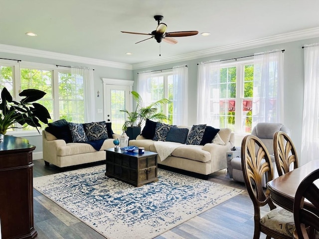 sunroom / solarium with a ceiling fan