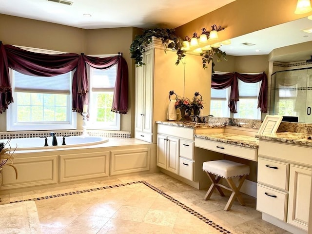 full bath with a stall shower, visible vents, a bath, and vanity