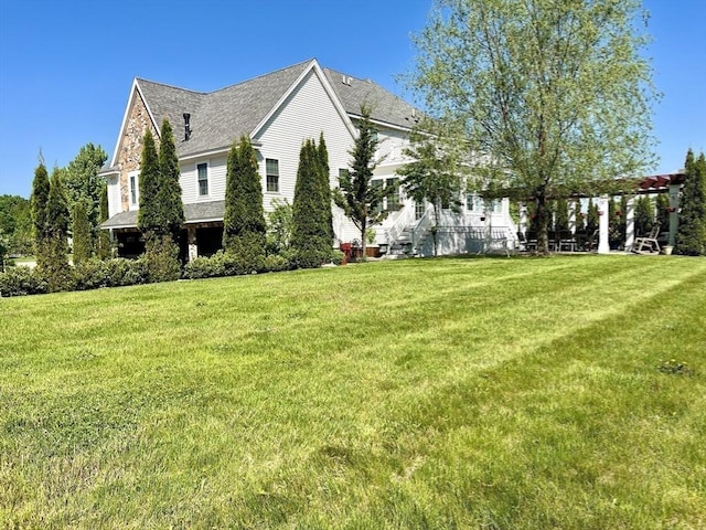 view of property exterior featuring a lawn