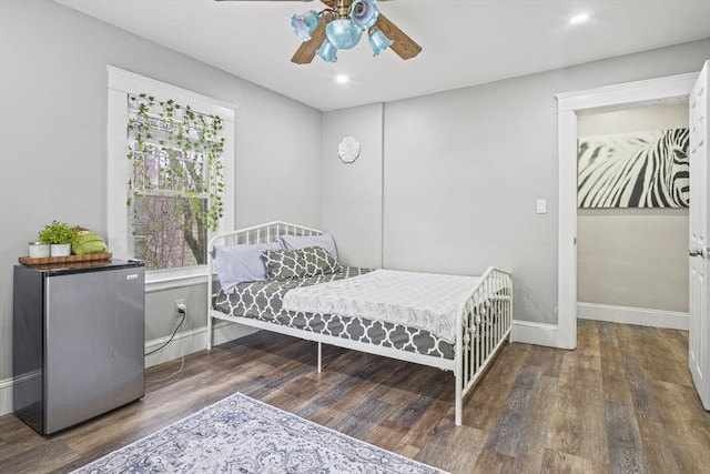 21 Vernon St, Lowell, MA 01850 - bedroom with freestanding refrigerator, recessed lighting, baseboards, and wood finished floors