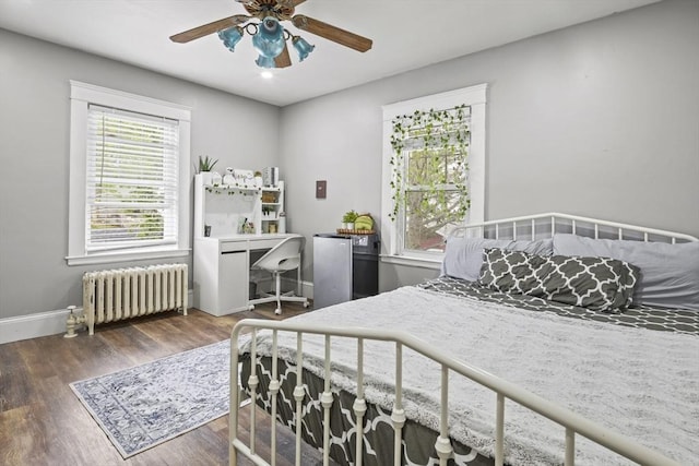 21 Vernon St, Lowell, MA 01850 - bedroom featuring baseboards, radiator, ceiling fan, and wood finished floors