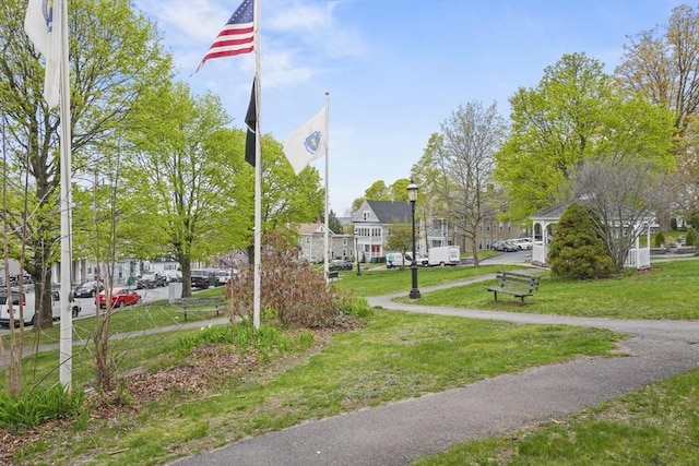 21 Vernon St, Lowell, MA 01850 - surrounding community featuring a residential view and a lawn