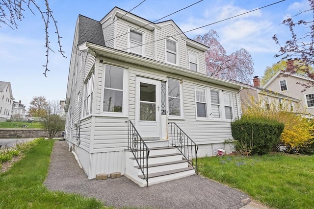 21 Vernon St, Lowell, MA 01850 - view of front of home featuring a front yard and entry steps