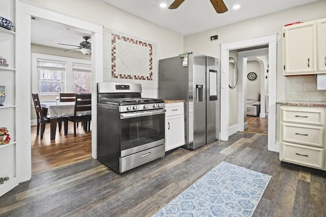 21 Vernon St, Lowell, MA 01850 - kitchen featuring backsplash, dark wood-style flooring, ceiling fan, and appliances with stainless steel finishes