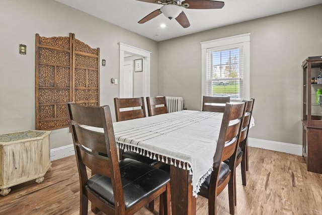 21 Vernon St, Lowell, MA 01850 - dining space with wood finished floors, baseboards, ceiling fan, radiator heating unit, and recessed lighting
