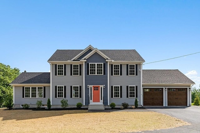 colonial-style house with a garage