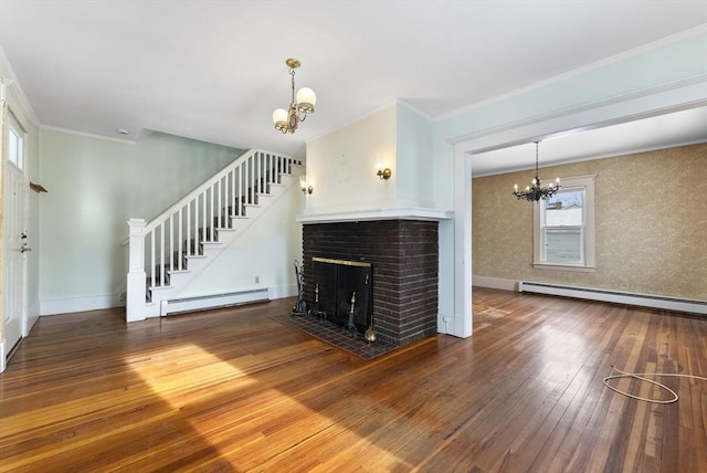 unfurnished living room with wood finished floors, stairs, baseboard heating, a baseboard heating unit, and a notable chandelier