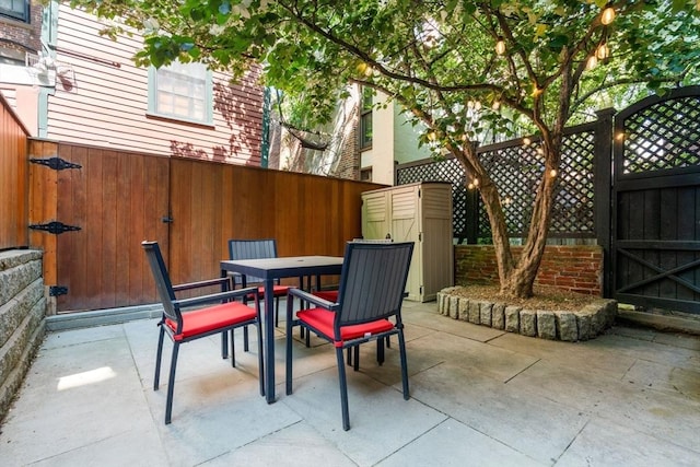 15 Hancock St Unit 1, Boston, MA 02114 - view of patio with a gate and outdoor dining area