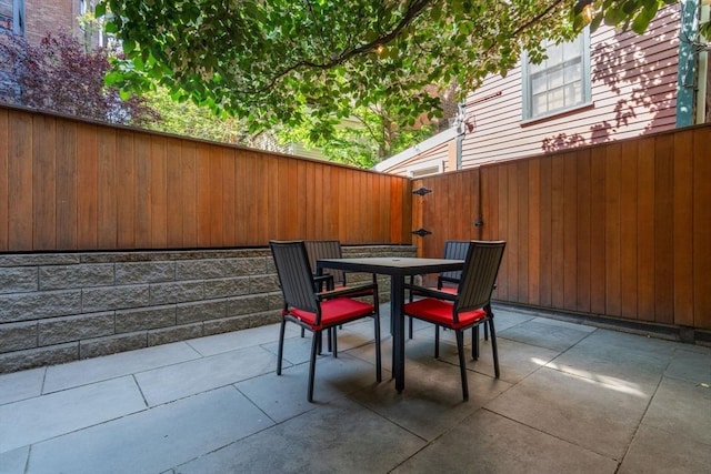 15 Hancock St Unit 1, Boston, MA 02114 - fenced backyard with a patio area and outdoor dining area