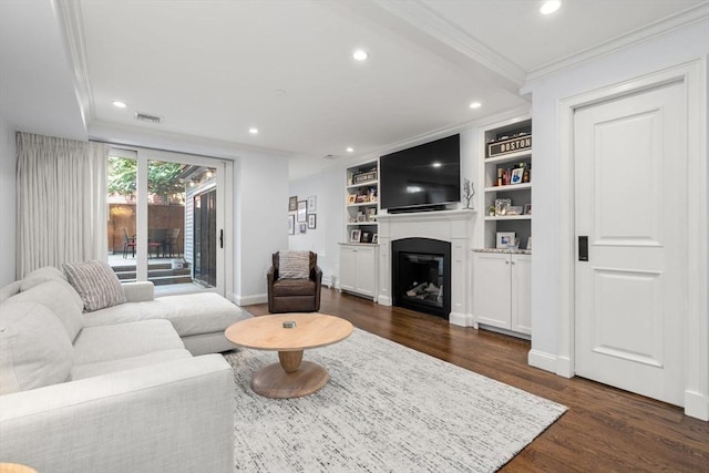 15 Hancock St Unit 1, Boston, MA 02114 - living room featuring crown molding, dark wood-type flooring, a fireplace, recessed lighting, and built in features