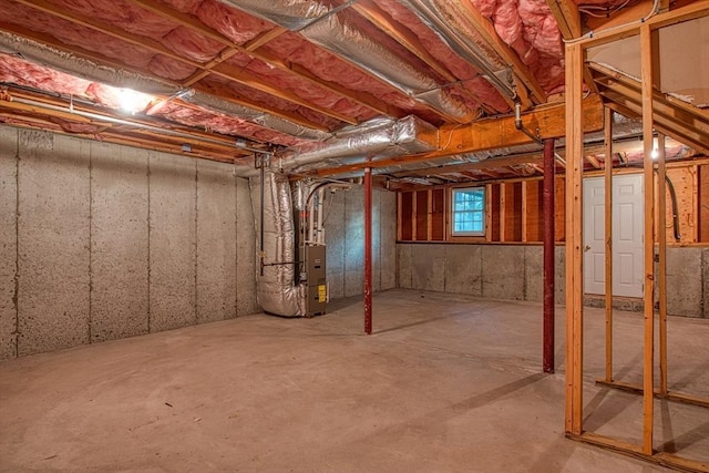 basement featuring heating unit