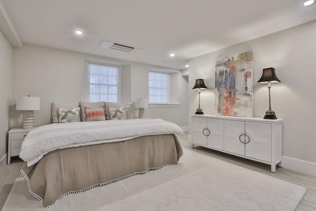 bedroom with light wood-type flooring