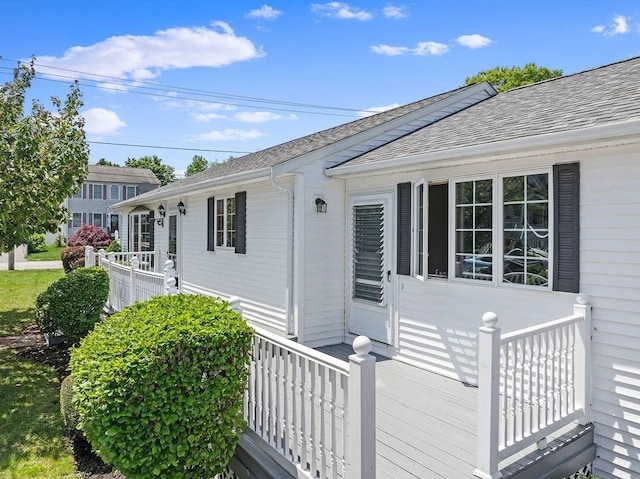 doorway to property with a deck