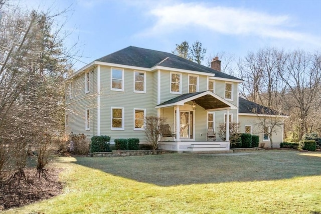 view of front of home with a front yard