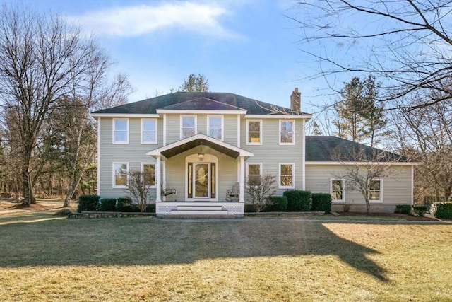 view of front facade featuring a front yard