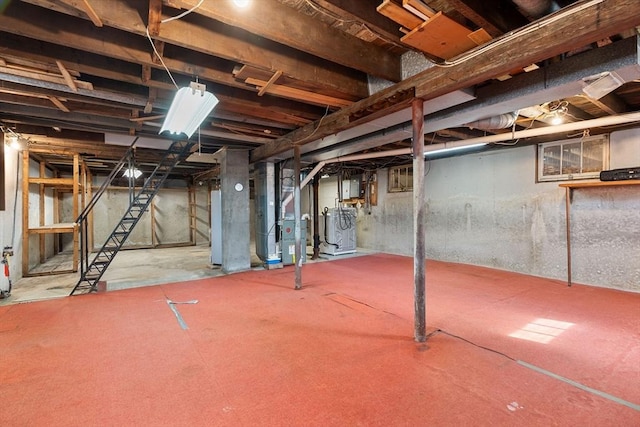 unfinished basement with electric panel and heating unit