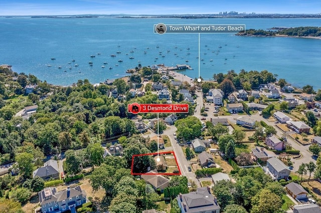 birds eye view of property featuring a residential view and a water view