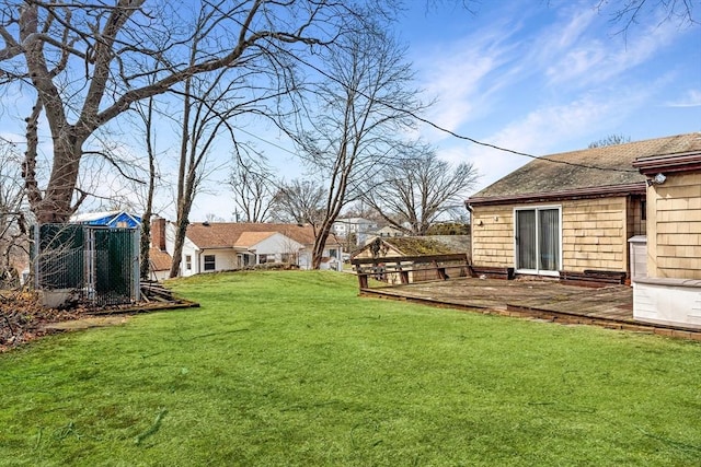 view of yard with a wooden deck