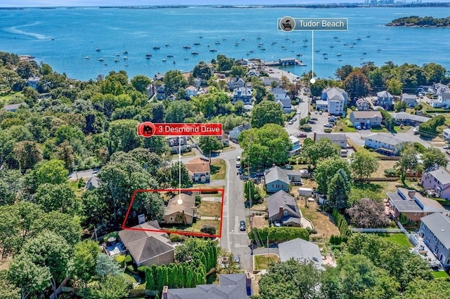 birds eye view of property featuring a residential view and a water view