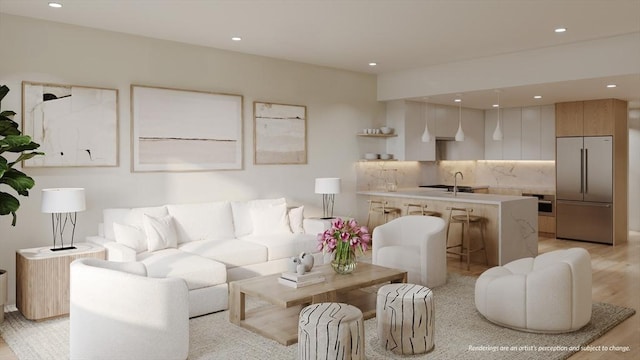 living area with recessed lighting and light wood-type flooring