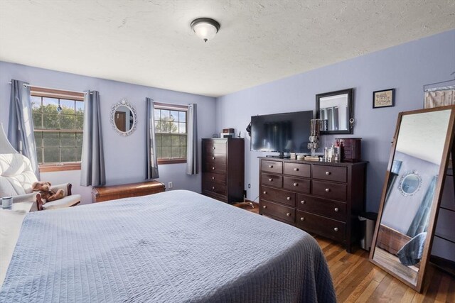 230 W St, Paxton, MA 01612 - bedroom with wood finished floors and a textured ceiling