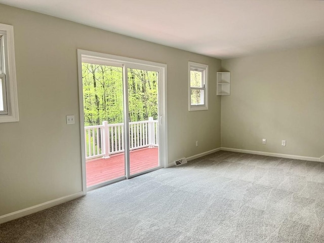 196 Munn Rd, Monson, MA 01057 - carpeted spare room with baseboards