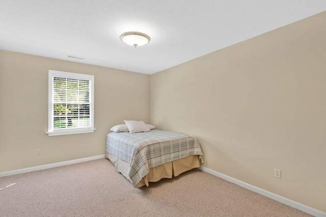 24 Heritage Cir E, Longmeadow, MA 01028 - carpeted bedroom with baseboards