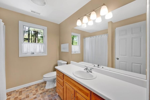 24 Heritage Cir E, Longmeadow, MA 01028 - full bath with baseboards, vanity, toilet, and a shower with curtain