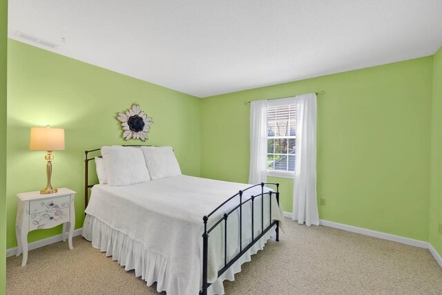 24 Heritage Cir E, Longmeadow, MA 01028 - carpeted bedroom with baseboards