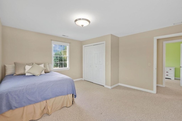 24 Heritage Cir E, Longmeadow, MA 01028 - bedroom featuring carpet floors, baseboards, and a closet