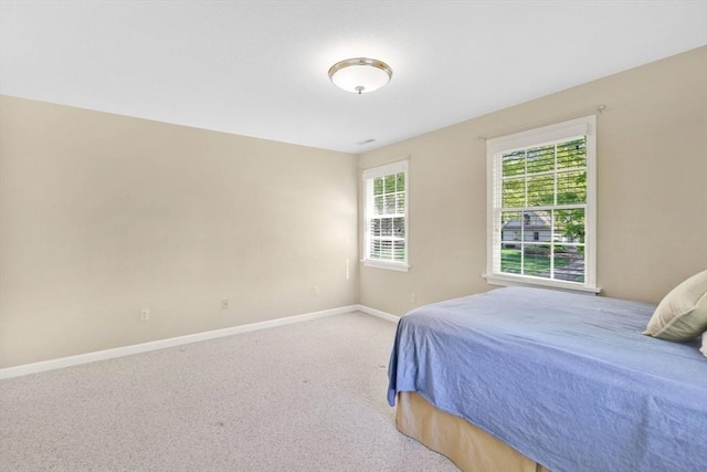 24 Heritage Cir E, Longmeadow, MA 01028 - carpeted bedroom featuring baseboards