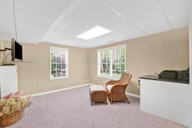 24 Heritage Cir E, Longmeadow, MA 01028 - living area with a paneled ceiling, carpet flooring, and baseboards
