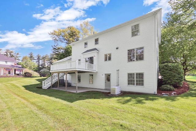 24 Heritage Cir E, Longmeadow, MA 01028 - back of property featuring a patio area, a yard, a deck, and stairway