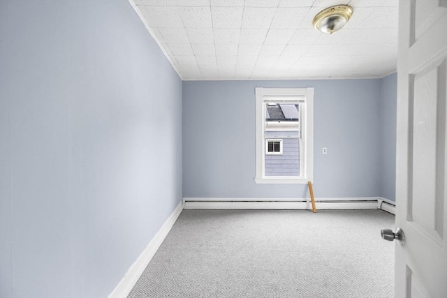 81-83 Walnut St, Lynn, MA 01905 - spare room with carpet, baseboards, and a baseboard heating unit