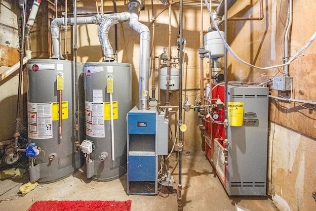 81-83 Walnut St, Lynn, MA 01905 - utility room with water heater and a heating unit
