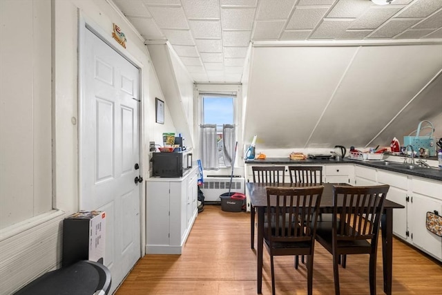 81-83 Walnut St, Lynn, MA 01905 - dining area with radiator and light wood-style flooring